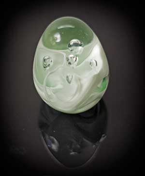 light green glass paperweight