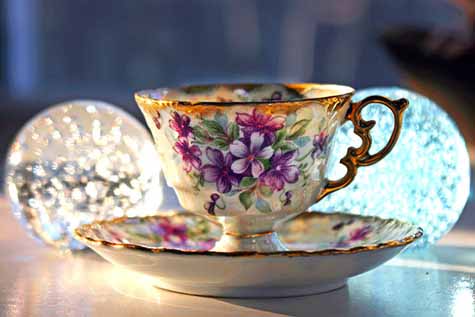 teacup and paperweights