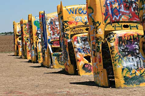 Cadillacs all buried nose down into the ground cadillac ranch cars