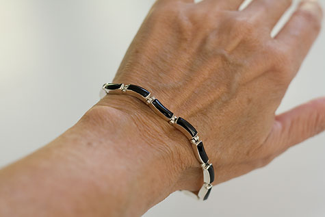 silver and black bracelet