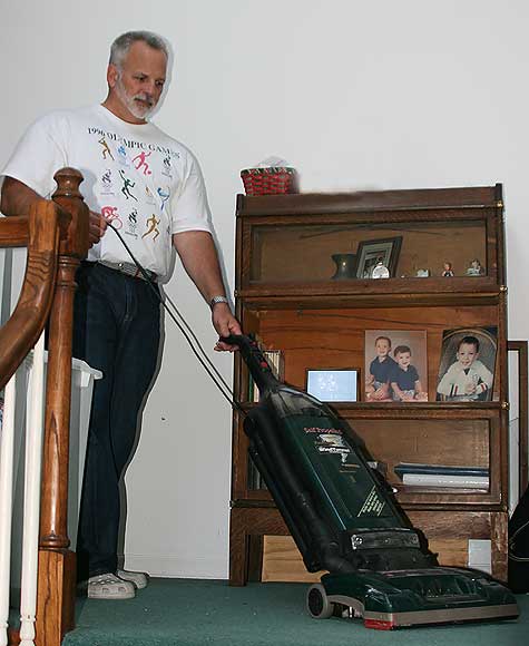 man with vacuum