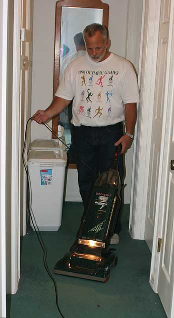 man with a vacuum