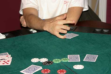poker hand sign and chips