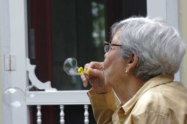 mom blowing bubbles