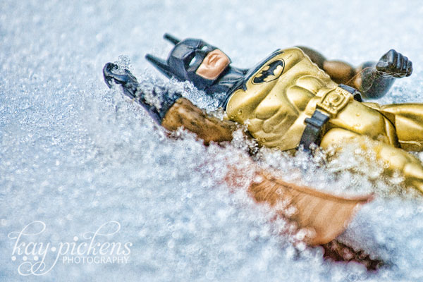 abandoned toy in the snow