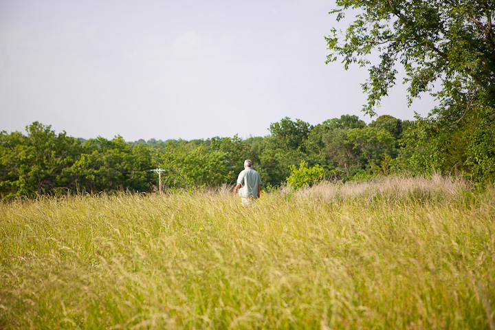man out standing in his field