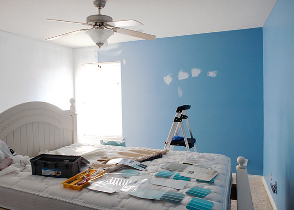 priming a brightly colored room