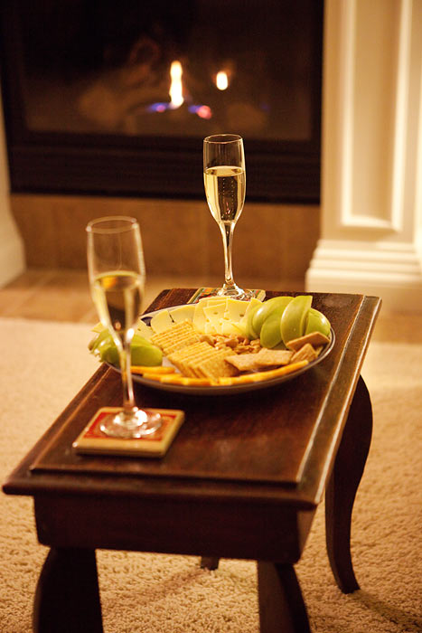champagne celebration by the fire