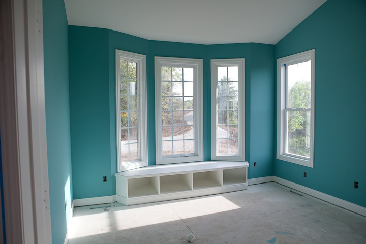 teal office in new house with window seat